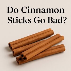 High-quality whole Ceylon and Cassia cinnamon sticks stored in a dry pantry container, showing fresh texture for home cooking.